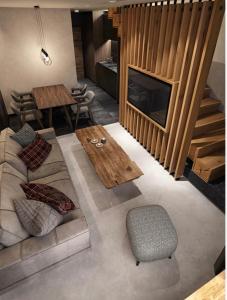 Posezení v ubytování Woodside Lux Duplex