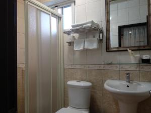 Koupelna v ubytování Ju Jia Xiao Zhan Homestay