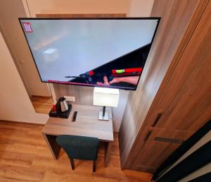 TV a/nebo společenská místnost v ubytování Sophien Hotel