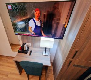 TV a/nebo společenská místnost v ubytování Sophien Hotel