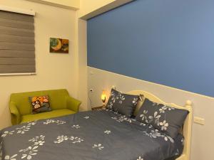 A bed or beds in a room at Ramble Travel Homestay