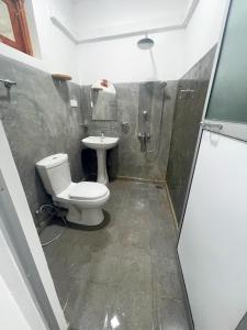 Koupelna v ubytování Komox Gedara