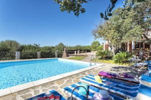 The swimming pool at or close to Villa Olive tree, immersa nella natura per relax e quiete