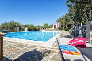 The swimming pool at or close to Villa Olive tree, immersa nella natura per relax e quiete