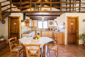 A kitchen or kitchenette at Villa Olive tree, immersa nella natura per relax e quiete