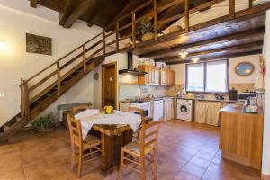 A kitchen or kitchenette at Villa Olive tree, immersa nella natura per relax e quiete