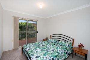 Ένα ή περισσότερα κρεβάτια σε δωμάτιο στο Westport Palms 2