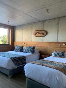 Postel nebo postele na pokoji v ubytování Hotel Amun