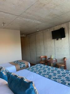 Postel nebo postele na pokoji v ubytování Hotel Amun