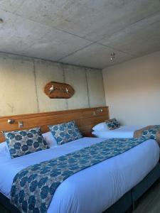 Postel nebo postele na pokoji v ubytování Hotel Amun