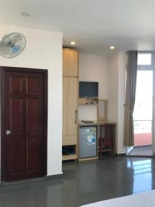 Kuchyň nebo kuchyňský kout v ubytování Tuyet Son Hotel