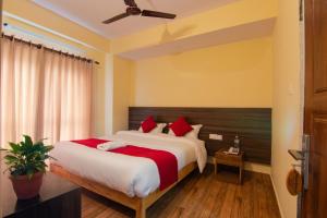 Postel nebo postele na pokoji v ubytování Hotel bivhuti