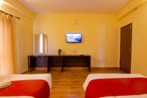 Postel nebo postele na pokoji v ubytování Hotel bivhuti