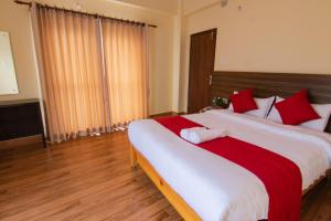 Postel nebo postele na pokoji v ubytování Hotel bivhuti