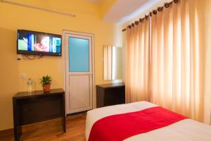 TV a/nebo společenská místnost v ubytování Hotel bivhuti