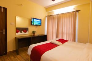 Postel nebo postele na pokoji v ubytování Hotel bivhuti