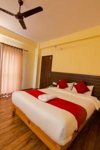 Postel nebo postele na pokoji v ubytování Hotel bivhuti