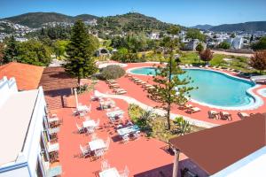 an aerial view of a resort with a swimming pool at Museum Resort Spa in Bodrum City