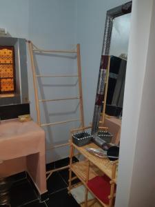 Postel nebo postele na pokoji v ubytování Riad Tazoulte