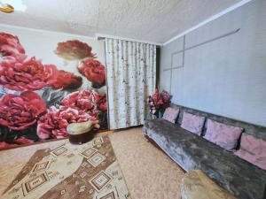 Χώρος καθιστικού στο Уютные апартаменты в самом центре города