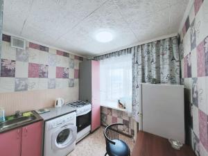 Η κουζίνα ή μικρή κουζίνα στο Уютные апартаменты в самом центре города