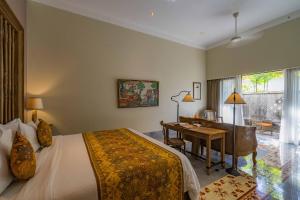 Postel nebo postele na pokoji v ubytování Sudamala Resort, Sanur, Bali