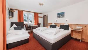Posteľ alebo postele v izbe v ubytovaní Berghotel-Gasthof Gstrein