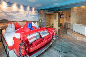 Posezení v ubytování Hotel Zeit & Traum Privat SPA