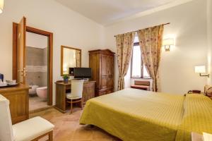 Postel nebo postele na pokoji v ubytování Hotel Gea Di Vulcano