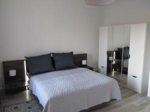 Postel nebo postele na pokoji v ubytování Appartment Ipsum