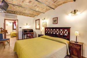 Postel nebo postele na pokoji v ubytování Hotel Gea Di Vulcano