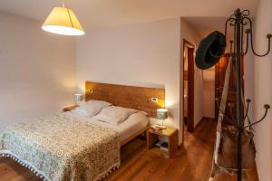 Postel nebo postele na pokoji v ubytování Maison Le Champ B&B Questa casa non è un albergo