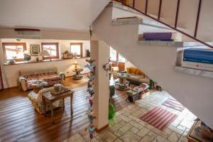 Posezení v ubytování Maison Le Champ B&B Questa casa non è un albergo