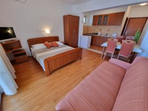 Posteľ alebo postele v izbe v ubytovaní Apartments CHIARA