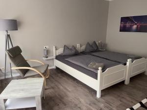 Postel nebo postele na pokoji v ubytování Pension am Schrotturm Bed & Breakfast