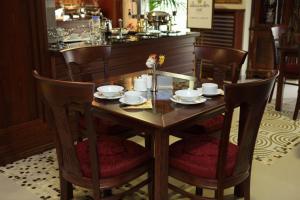 Reštaurácia alebo iné gastronomické zariadenie v ubytovaní Alexander Mountain Resort
