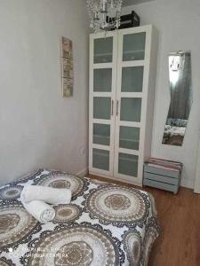 Postel nebo postele na pokoji v ubytování centro Madrid Familiar alojamiento termporal