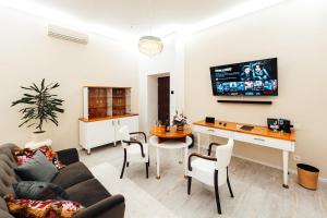 TV a/nebo společenská místnost v ubytování Hotel Baltaci Atrium