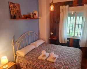 Postel nebo postele na pokoji v ubytování La Casa Junto al Sendero del Río & Piscina # aire acondicionado