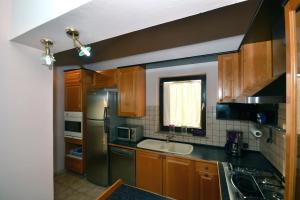 Kuchyň nebo kuchyňský kout v ubytování Apartments Jasminka