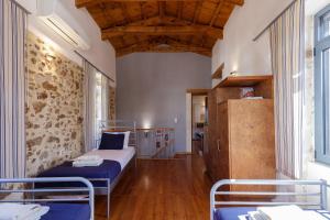 Posteľ alebo postele v izbe v ubytovaní Erasmia's Venetian House