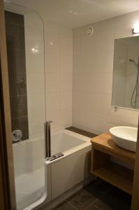 Kúpeľňa v ubytovaní Apartment Dorfjuwel