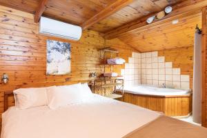 Postel nebo postele na pokoji v ubytování Nof kinnert + 37 fotografií
