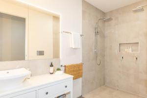 a bathroom with a sink and a shower at Hanging Rock Views in Woodend