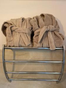 a towel is sitting on top of a metal rack at Happy Amadei in Sankt Veit im Pongau