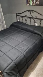 Postel nebo postele na pokoji v ubytování IL COLOSSEO B&B CASSINO