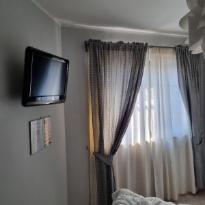 Televisi dan/atau pusat hiburan di IL COLOSSEO B&B CASSINO