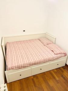 Ένα ή περισσότερα κρεβάτια σε δωμάτιο στο Trilocale IL GLICINE