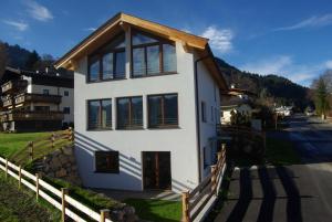 a house in the middle of a mountain at Appartement Klausner in Kitzbühel