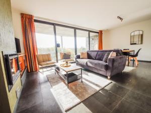 Posezení v ubytování Chalet near Durbuy with Pool & Nature Trails